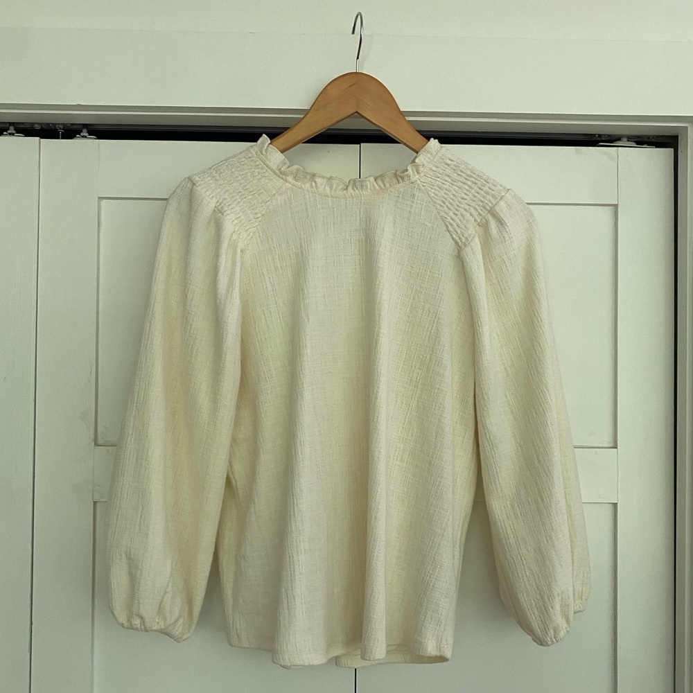 Cream blouse from Anthropologie. Size small.